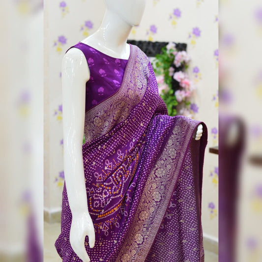 Beautiful pure banarasi moonga bandhini silk saree paired up with pretty blouse. Blouse sizes can be customized ready to wear blouse full