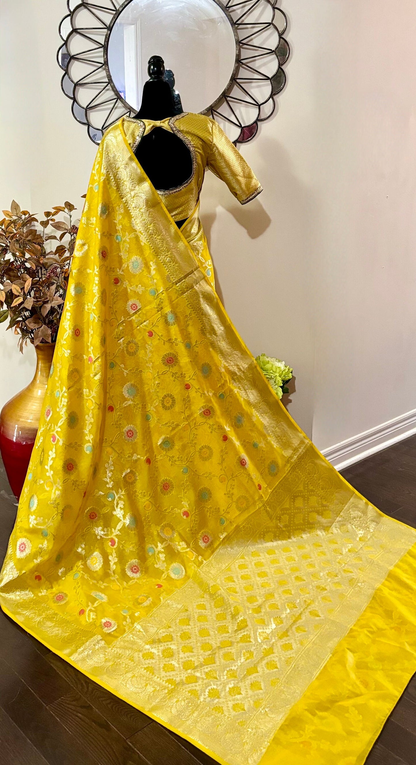 Banarasi kora organza saree with beautiful Jal all over the saree. Saree is ready with beautiful designer blouse that fit to 32-46