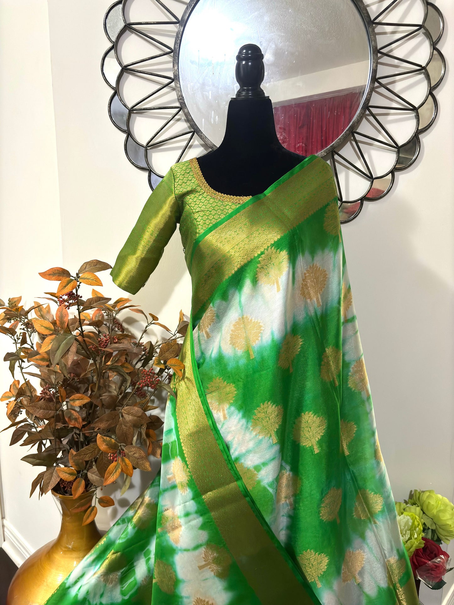 Banarasi kora organza saree with beautiful tie and dye all over the saree. Saree is ready with beautiful designer blouse that fit to 32-46