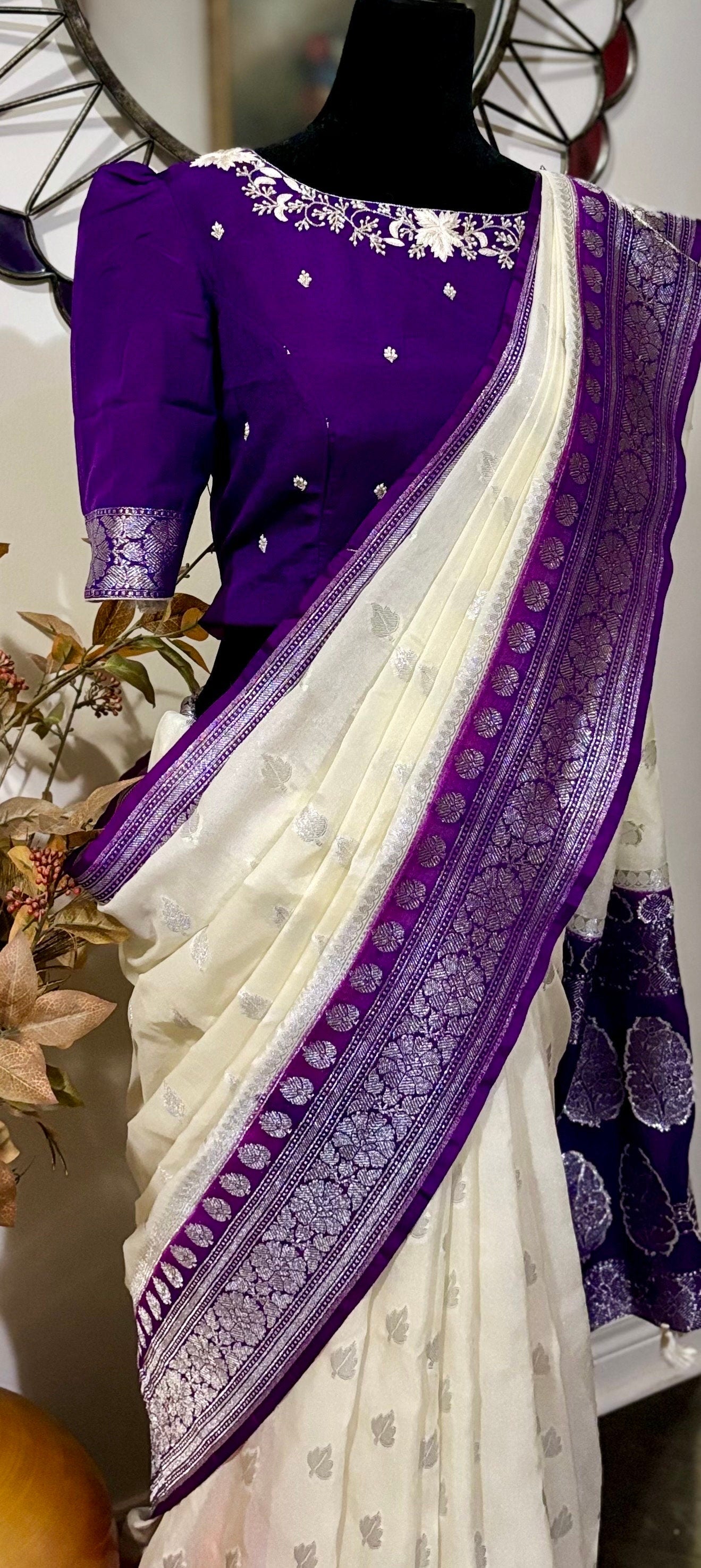 Beautiful banarasi saree paired up with pretty maggam work blouse.dits to 32-46