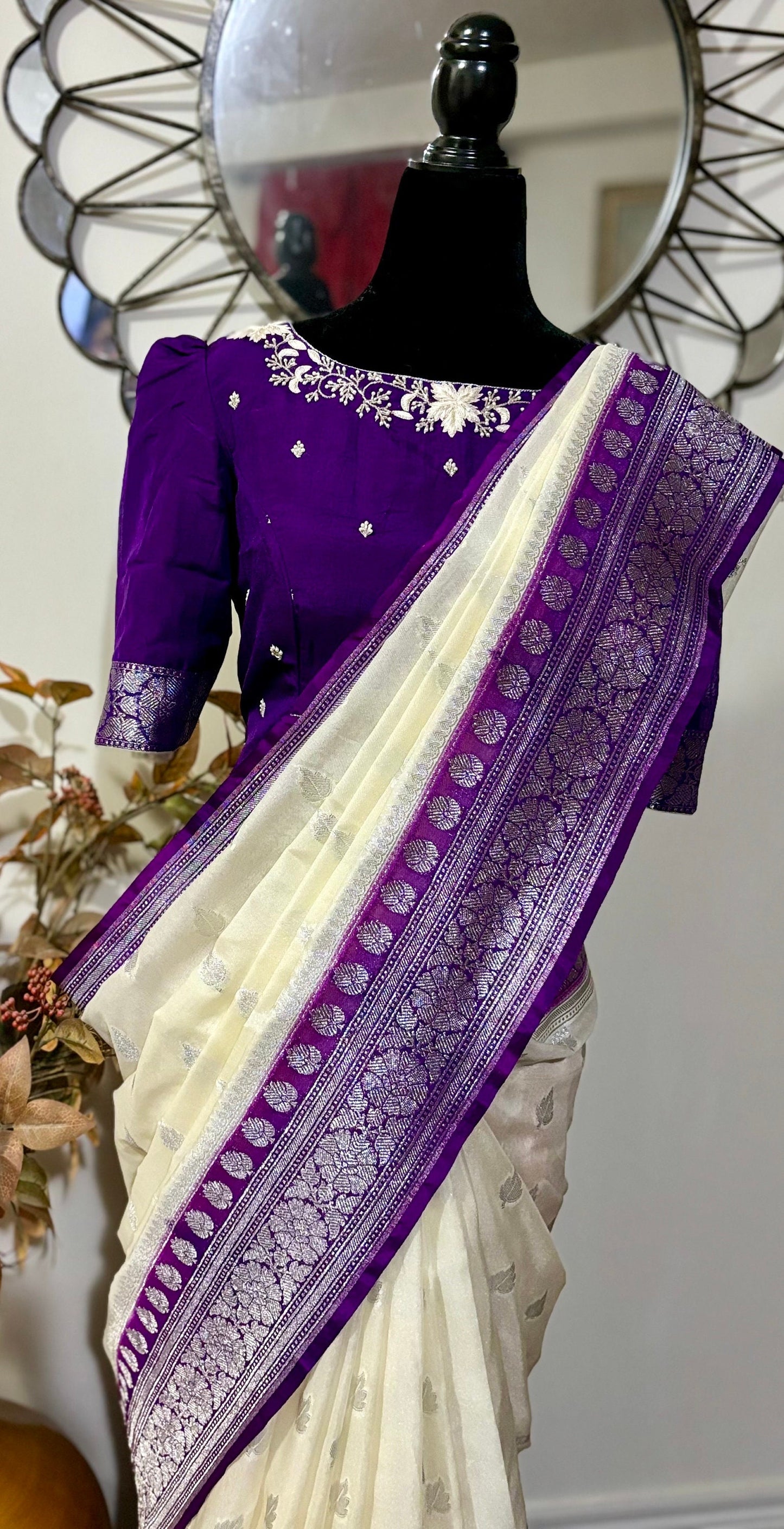 Beautiful banarasi saree paired up with pretty maggam work blouse.dits to 32-46